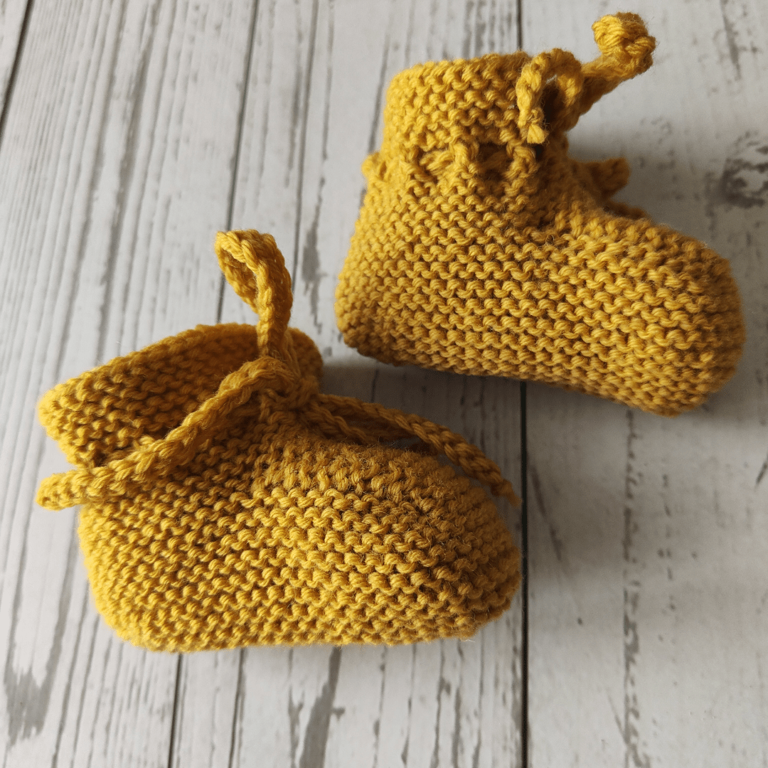 Babyfinkli handgestrickt gelb