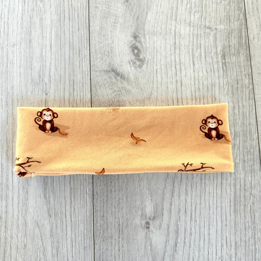 hellorange mit Affe und Banane