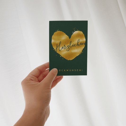 grüne karte mit goldenem herz